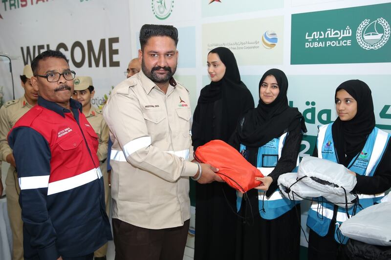 Dubai Police have provided warm winter clothes to 350 workers in Jebel Ali as part of a campaign. Photo: Dubai Police