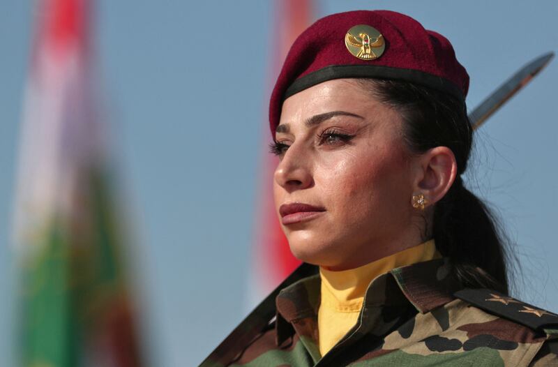 Iraqi-Kurdish Peshmerga officers graduate in Erbil, the capital of Iraq's autonomous Kurdish region. All photos: AFP