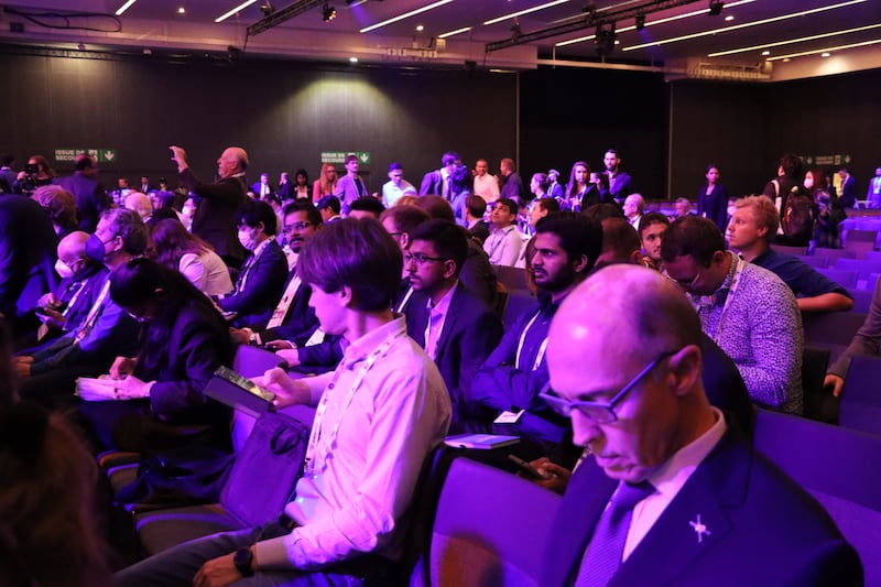 Visitors attend the opening ceremony of the IAC 2022 in Paris on September 18.