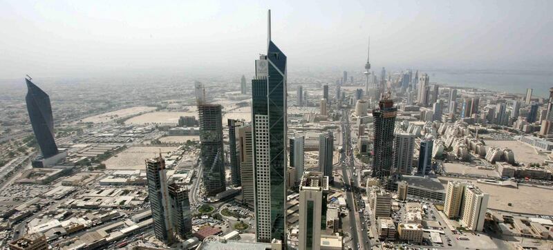 A picture shows a general view of Kuwait City, as seen from Al-Hamra Tower on November 15, 2009. When completed, the tower will become the tallest skyscraper in Kuwait and one of the top 10 tallest towers in the world. Construction on the tower, which will be 450 metres tall and comprise 77 floors, started in 2005. The tower will include 100,000 metre square of commercial and office space, as well as movie theatres, a rooftop restaurant and a spa. AFP PHOTO/YASSER AL-ZAYYAT