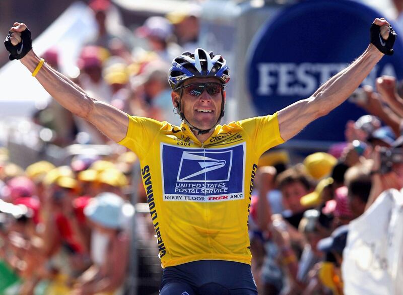 LE GRAND BORNAND, FRANCE - JULY 22:  Lance Armstrong of the USA and riding for US Postal Service presented by Berry Floor celebrates as he wins stage 17 of the Tour de France on July 22, 2004 from Bourg d'Oisans to le Grand Bornand, France. (Photo by Doug Pensinger/Getty Images)
