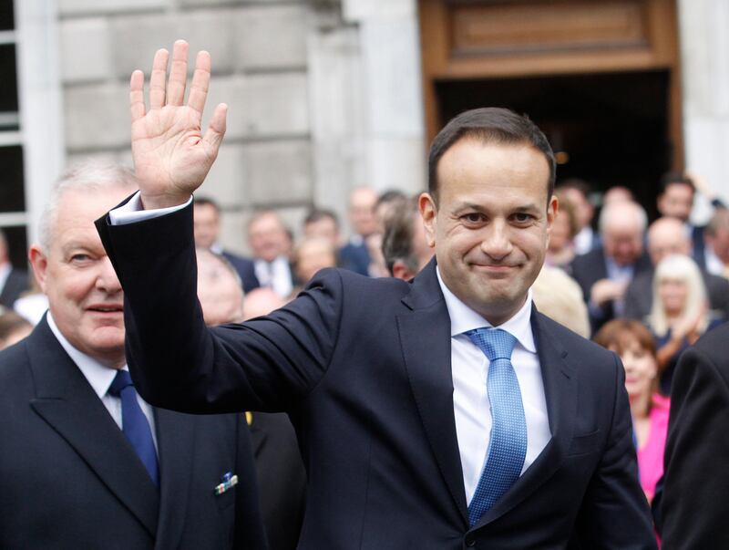 FILE - A Wednesday, June 14, 2017 file photo of Ireland's new Prime Minister Leo Varadkar waving after being elected Ireland's 14th Taoiseach (Prime Minister) at Leinster House, Dublin, Ireland. The EU blocâ€™s chief negotiator, Michel Barnier, said last month there was "a clock ticking" on the Brexit talks. Irish Prime Minister Leo Varadkar said last week that Brexit advocates "already had 14 months" to issue detailed proposals, but had not. (AP Photo/Peter Morrison, File)