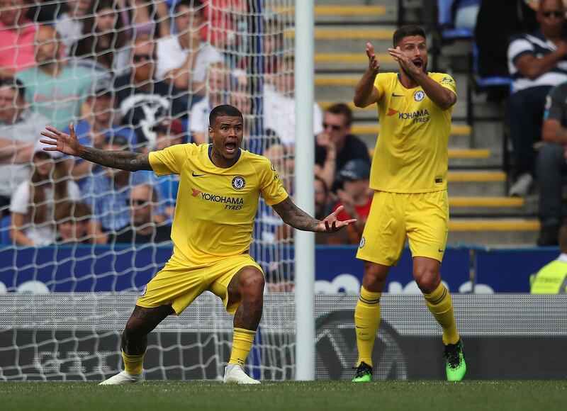 Kenedy and Giroud of Chelsea appeal for a hand ball. Getty