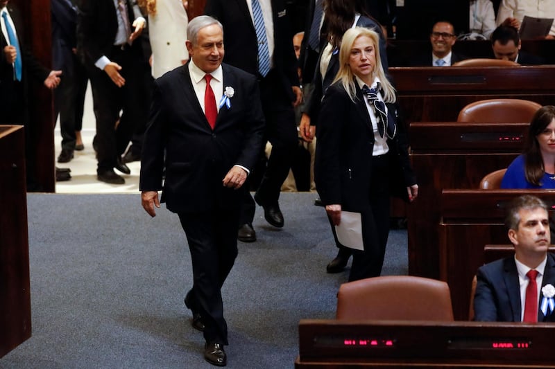 Israeli Prime Minister Benjamin Netanyahu walks into the parliament in Jerusalem, Thursday., Oct. 3, 2019, ahead of swearing-in of the new Israel's parliament. (AP Photo/Ariel Schalit)