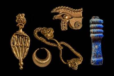 Gold objects, jewellery and a Djed pillar, symbol of stability, made of lapis lazuli were retrieved at Thonis-Heracleion. Franck Goddio / Hilti Foundation