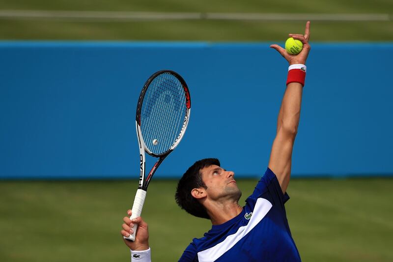 LONDON, ENGLAND - JUNE 17: Novak Djokovic of Serbia serves during qualifying Day 2 of the Fever-Tree Championships at Queens Club on June 17, 2018 in London, United Kingdom. (Photo by Marc Atkins/Getty Images)