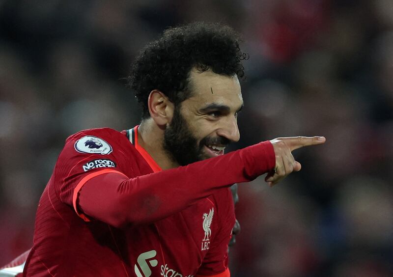 21. Mohamed Salah celebrates scoring their fourth goal in the 4-0 win against Manchester United on April 19. Reuters