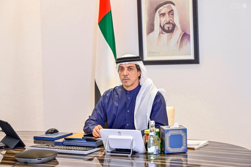 Sheikh Mansour bin Zayed, Deputy Prime Minister and Minister of Presidential Affairs, attends a remote government meeting to discuss the UAE's post-coronavirus future. Courtesy: Dubai Media Office Twitter