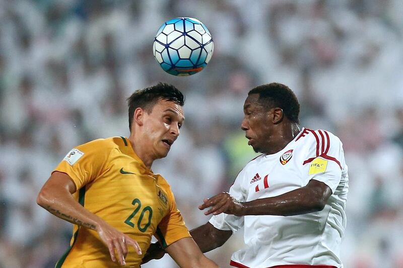 Trent Sainsbury of Australia competes for the ball with UAE striker Ahmed Khalil, right. Francois Nel / Getty Images