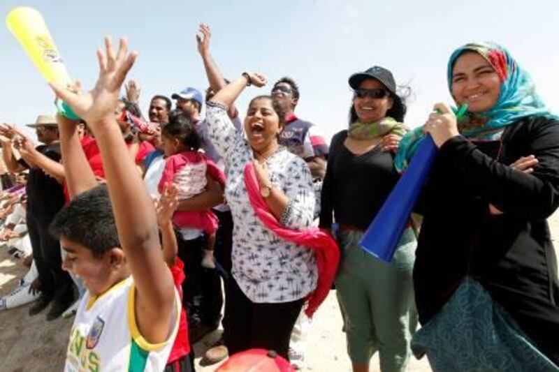 Members of the Indian community in the UAE enjoy a cricket match in Umm Al Quwain, Dubai.