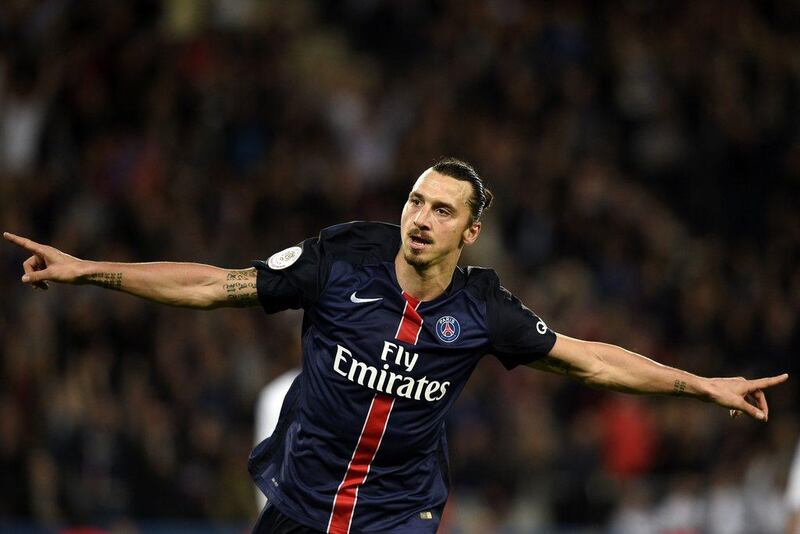 Paris Saint-Germain's Zlatan Ibrahimovic celebrates after scoring his second goal against Toulouse on Saturday in Ligue 1. Franck Fife / AFP / November 7, 2015  