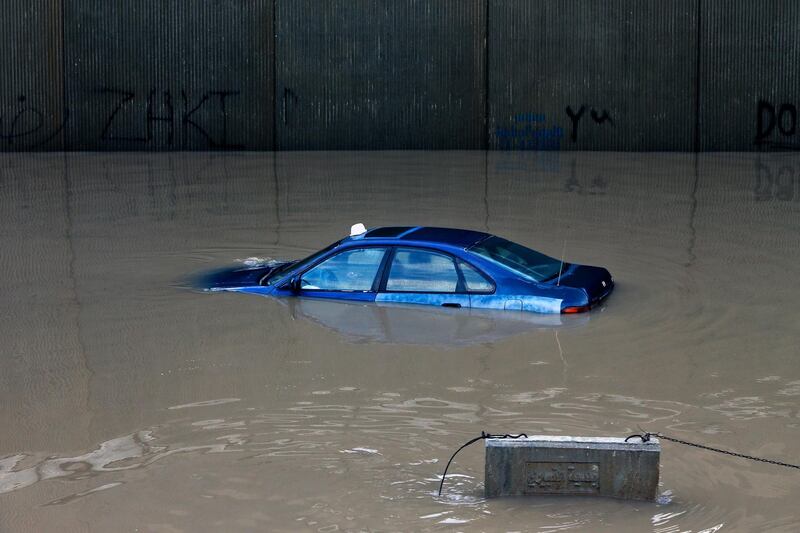 A car is stuck in a flooded tunnel in Beirut's southern suburb of Ouzai, Lebanon. AP Photo