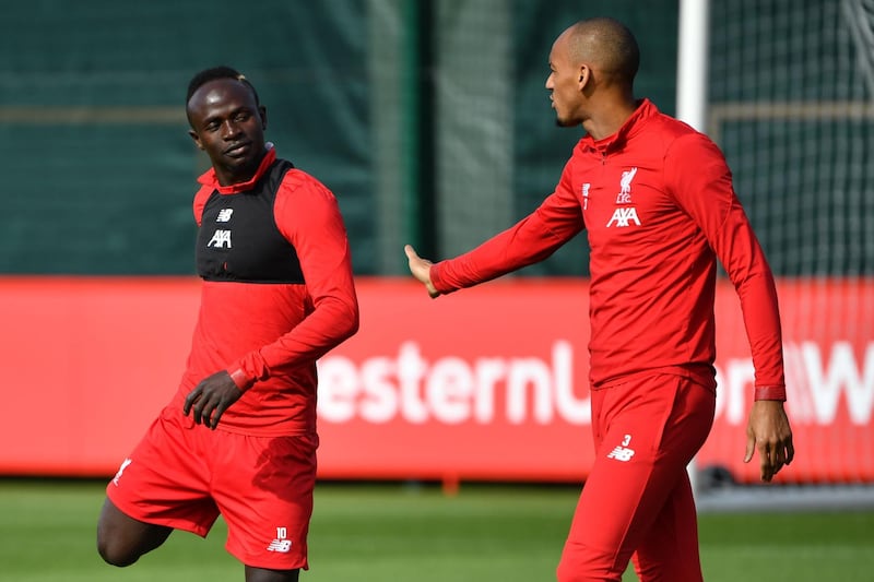 Liverpool's Senegalese striker Sadio Mane Brazilian midfielder Fabinho take part in a training session. AFP