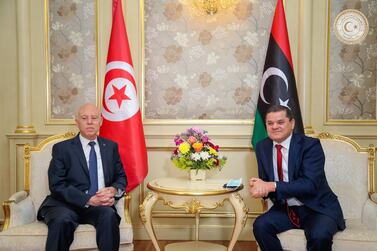 Tunisia's President Kais Saied meets Libya's interim Prime Minister Abdul Hamid Dbeibeh in Tripoli. Reuters