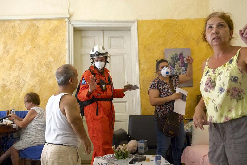 LEBANON, Beirut. 9th August 2020
SARAID member Suzie Cooper speaks with local residents about their building as they assess a building and it's structural damage from the blast. 
SARAID is a British charity which arrived in Beirut 49 hours after a blast ripped through the city, causing more than 140 deaths, 300,000 homeless and structural damage to a 20km radius. 