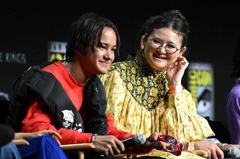 Muhafidin and Megan Richards, who plays Harfoot Poppy Proudfellow, answer questions onstage at Comic-Con International.