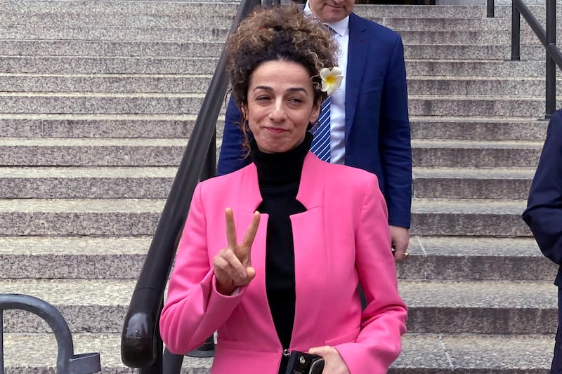 Masih Alinejad leaves federal court in New York after giving a victim impact statement at the sentencing of Niloufar Bahadorifar. AP