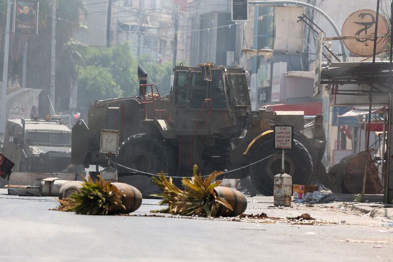 An Israeli army bulldozer drives through Jenin. AFP
