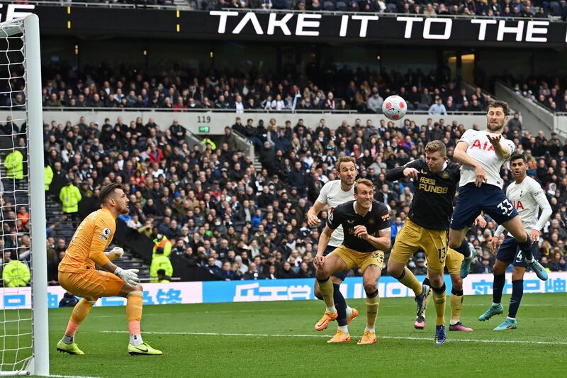 Toittenham's Ben Davies heads past goalkeeper Martin Dubravka to level. AFP