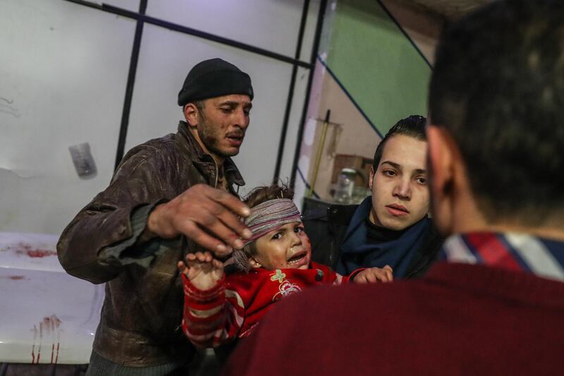 Injured children are treated at a hospital in rebel-held Douma, Eastern Ghouta, Syria, 19 February 2018. Mohammed Badra / EPA