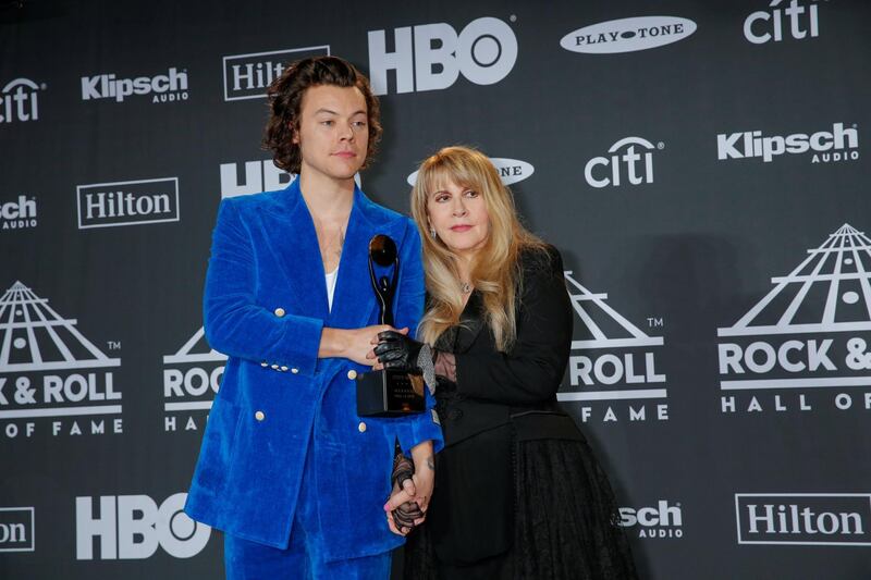 Harry Styles and inductee Stevie Nicks pose for pictures at the press room during the 2019 Rock and Roll Hall of Fame induction ceremony in Brooklyn, New York, U.S., March 29, 2019.  REUTERS/Eduardo Munoz