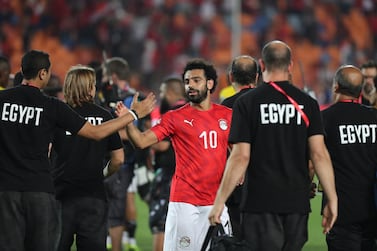 Egypt's Mohamed Salah celebrates after their opening win against Zimbabwe at Cairo International Stadium late on Friday. Gavin Barker / EPA