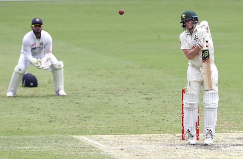 Australia's Steve Smith is caught behind off the bowling of Mohammed Siraj. AP