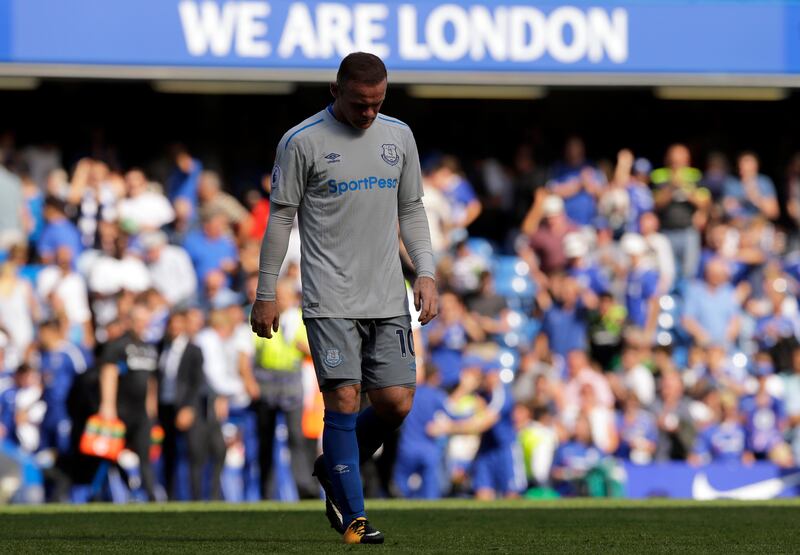Everton's Wayne Rooney walks on the pitch at the end of the English Premier League soccer match between Chelsea and Everton at Stamford Bridge stadium in London, Sunday, Aug. 27, 2017. Chelsea won 2-0. (AP Photo/Alastair Grant)