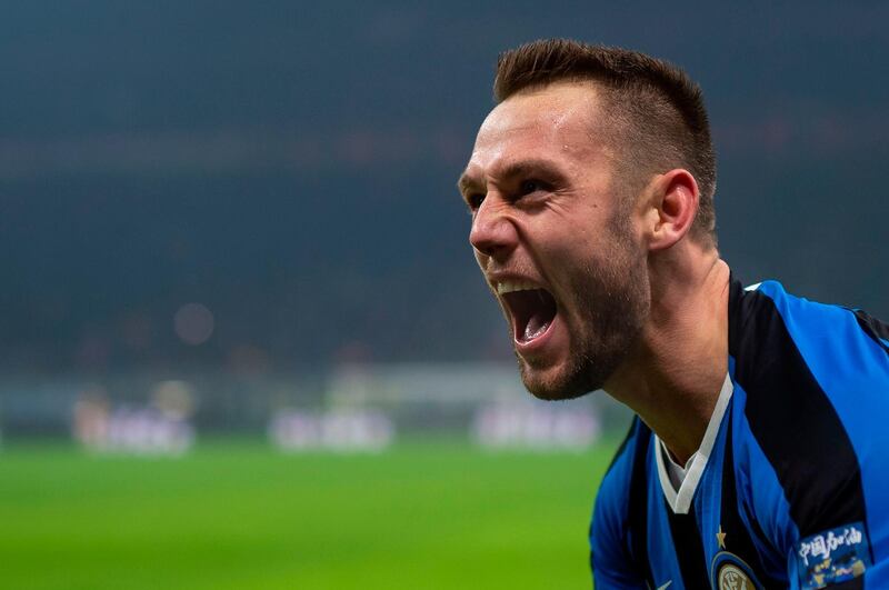 Inter Milan's defender Stefan de Vrij celebrates after giving the home side the lead. AFP
