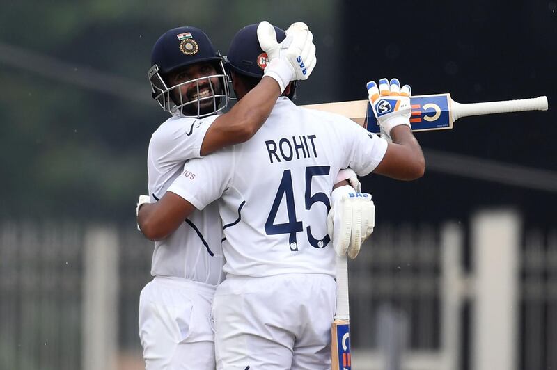 India's Rohit Sharma (R) celebrates his century (100 runs) with teammate Ajinkya Rahane during the first day of the third and final Test match between India and South Africa at the Jharkhand State Cricket Association (JSCA) stadium in Ranchi on October 19, 2019. ----IMAGE RESTRICTED TO EDITORIAL USE - STRICTLY NO COMMERCIAL USE-----
 / AFP / Money SHARMA / ----IMAGE RESTRICTED TO EDITORIAL USE - STRICTLY NO COMMERCIAL USE-----
