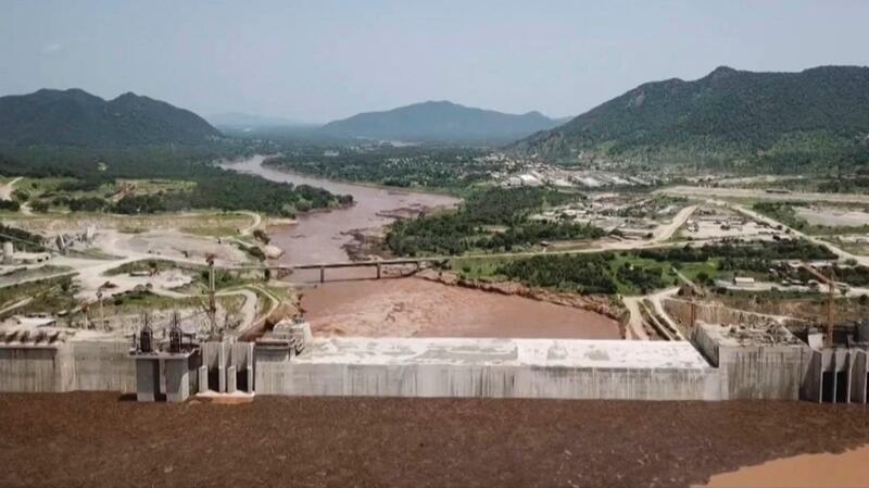 This frame grab from a video obtained from the Ethiopian Public Broadcaster (EBC) on July 20 and July 21, 2020 and released on July 24, 2020 shows an aerial view of water levels at the Grand Ethiopian Renaissance Dam in Guba, Ethiopia, as Prime Minister Abiy Ahmed hails the "historic" early filling of the reservoir on the Blue Nile River that has stoked tensions with downstream neighbours Egypt and Sudan. (Photo by - / Ethiopian Public Broadcaster (EBC) / AFP) / RESTRICTED TO EDITORIAL USE - MANDATORY CREDIT "AFP PHOTO /Ethiopian Public Broadcaster (EBC) " - NO MARKETING - NO ADVERTISING CAMPAIGNS - DISTRIBUTED AS A SERVICE TO CLIENTS