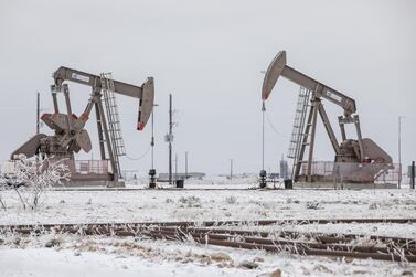 Pump jacks operate in the Permian Basin in Midland, Texas, U.S, on Saturday, Feb. 13, 2021. The arctic freeze gripping the central U.S. is raising the specter of power outages in Texas and ratcheting up pressure on energy prices already trading at unprecedented levels. Photographer: Matthew Busch/Bloomberg