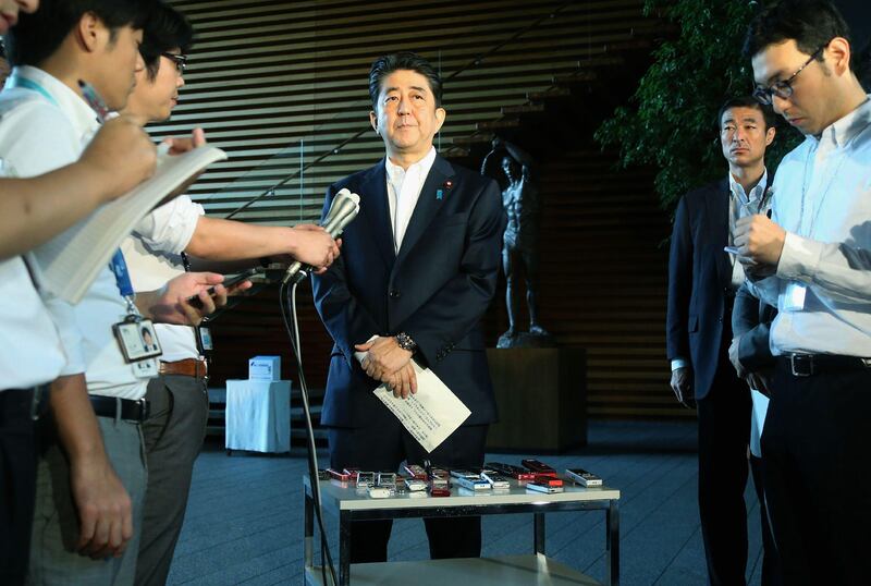 Japan's prime minister Shinzo Abe speaks to the media at his official residence in Tokyo on August 29, 2017, after a ballistic missile was launched by North Korea. AFP