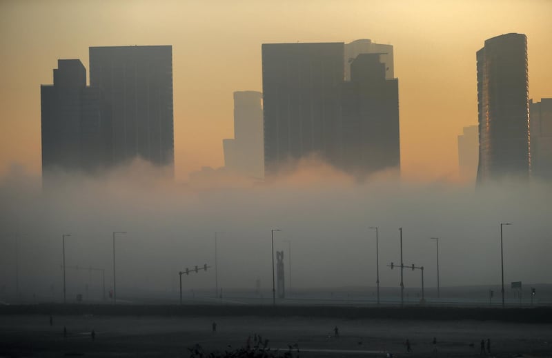 Abu Dhabi - United Arab Emirates - 22Dec2017 - Dense fog engulfed Abu Dhabi city in the morning having poor visibilty for motorist. Ravindranath K / The National