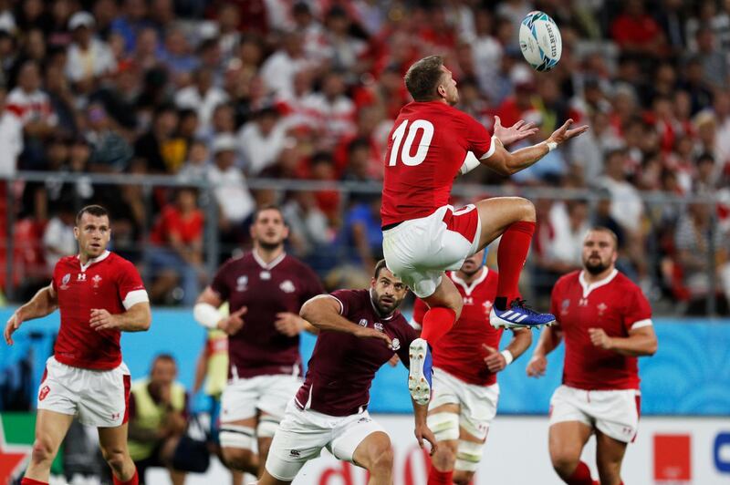 Wales' fly-half Dan Biggar jumps for the ball during Monday's game against Georgia. AFP