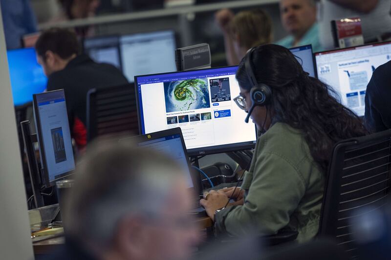 Technicians monitor Hurricane Ian at Fema in Washington. AFP