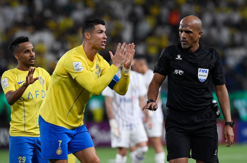 Al Nassr's Cristiano Ronaldo remonstrates with referee Ahmed Al Kaf. Reuters