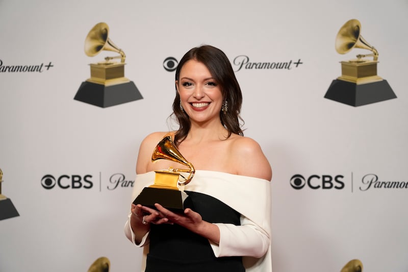 Stephanie Economou with her Grammy for Best Score or Soundtrack for Video Games and Other Interactive Media for Assassin's Creed Valhalla: Dawn of Ragnarok. AP