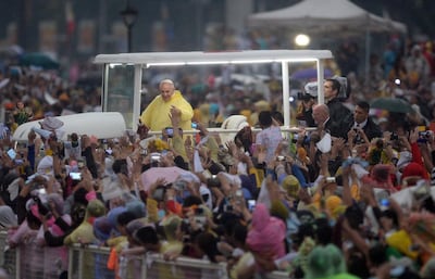 Pope Francis greets the largest papal crowd of seven million people at a park in Manila, the Philippines in 2015. AFP