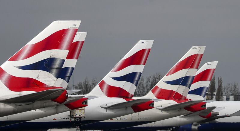 International Airlines Group recorded £916 million in pre-tax losses for the first three months of the year. PA