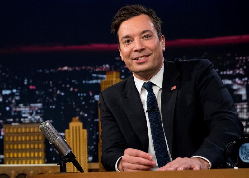 FILE - In this Friday, Sept. 16, 2016, file photo, Jimmy Fallon talks during a taping of "The Tonight Show with Jimmy Fallon," in New York. U.S. President Donald Trump is telling Fallon to â€œbe a manâ€ and stop â€œwhimperingâ€ about the personal anguish he felt over the backlash he received after messing up Trumpâ€™s hair during a 2016 campaign appearance on Fallonâ€™s late-night talk show. (AP Photo/Andrew Harnik, File)