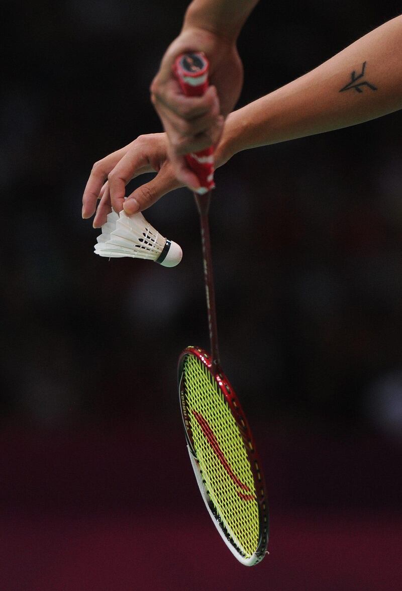 LONDON, ENGLAND - AUGUST 05:  Detail as Lin Dan of China prepares to serve during his Men's Singles Badminton Gold Medal match against Chong Wei Lee of Malaysia on Day 9 of the London 2012 Olympic Games at Wembley Arena on August 5, 2012 in London, England.  (Photo by Michael Regan/Getty Images)