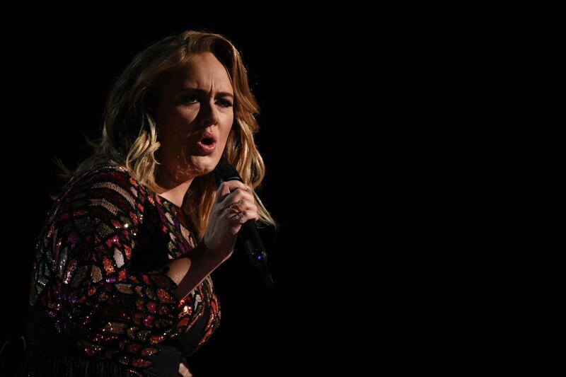 British singer Adele performs onstage during the 59th Annual Grammy music Awards on February 12, 2017, in Los Angeles, California. (Photo by VALERIE MACON / AFP)