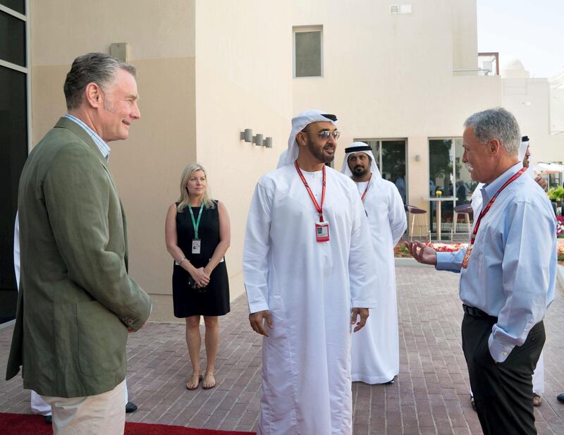 Sheikh Mohammed bin Zayed, Crown Prince of Abu Dhabi and Deputy Supreme Commander of the UAE Armed Forces, centre, meets with Chase Carey, chairman and CEO of Formula 1 Group, right, on the second day of the Formula 1 Etihad Airways Abu Dhabi Grand Prix. They are seen with Al Tareq Al Ameri, the CEO of the Yas Marina Circuit, back centre. Mohamed Al Hammadi / Crown Prince Court - Abu Dhabi