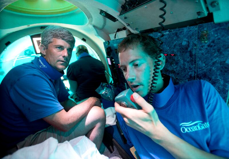 Stockton Rush, left, chief executive and co-founder of OceanGate, is missing on a submarine dive to view the Titanic. AP