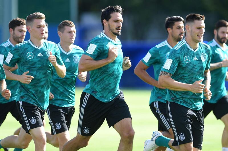 Germany's defender Mats Hummels (C) attends a training session in Vatutinki on June 25, 2018, during the Russia 2018 World Cup football tournament. 
  - 
 / AFP / Patrik STOLLARZ
