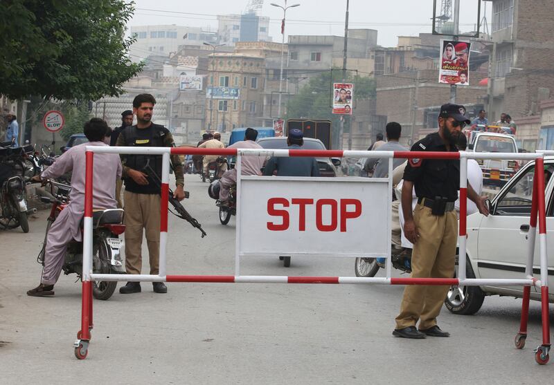 Pakistani police at a checkpoint in Peshawar on Wednesday. AP