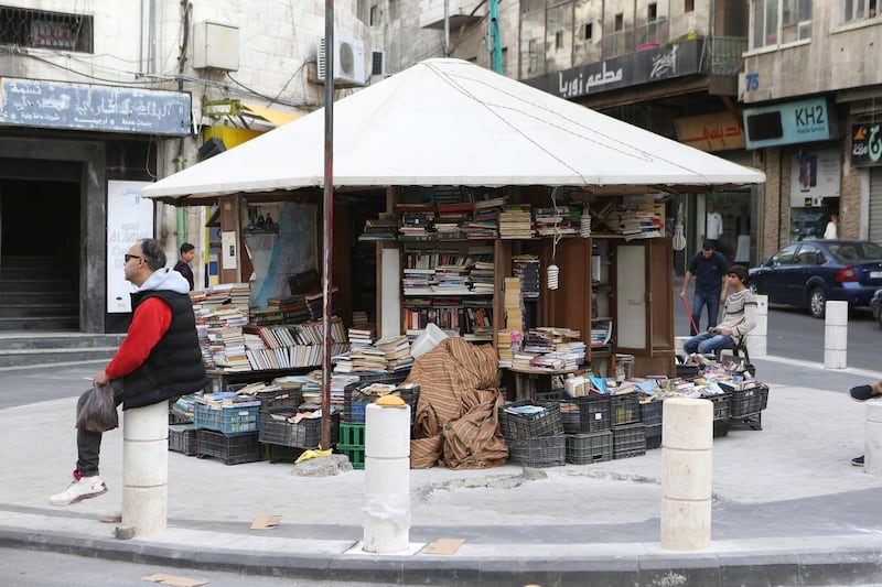 Al Jahiz library's Kiosk, is opened again by the brothers of it's owner Hisham Al Maayteh, a Jordanian bookseller who died a month after his bookstore was burnt out, in Amman, Jordan. (Salah Malkawi for The National)