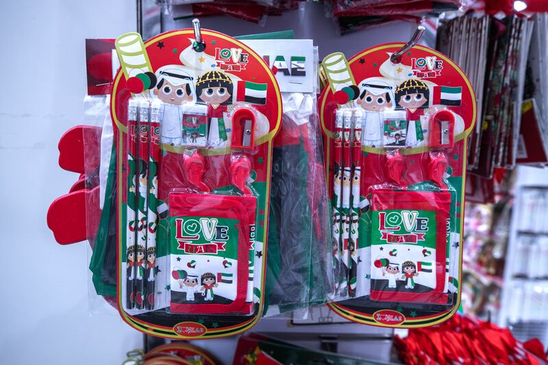 National Day memorabilia for sale at Daiso in Abu Dhabi. Victor Besa / The National