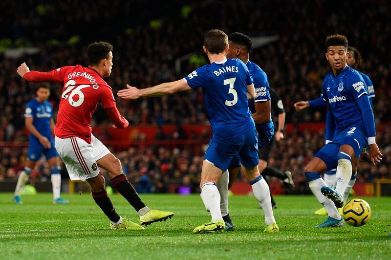 Manchester United striker Mason Greenwood scores their equaliser. AFP